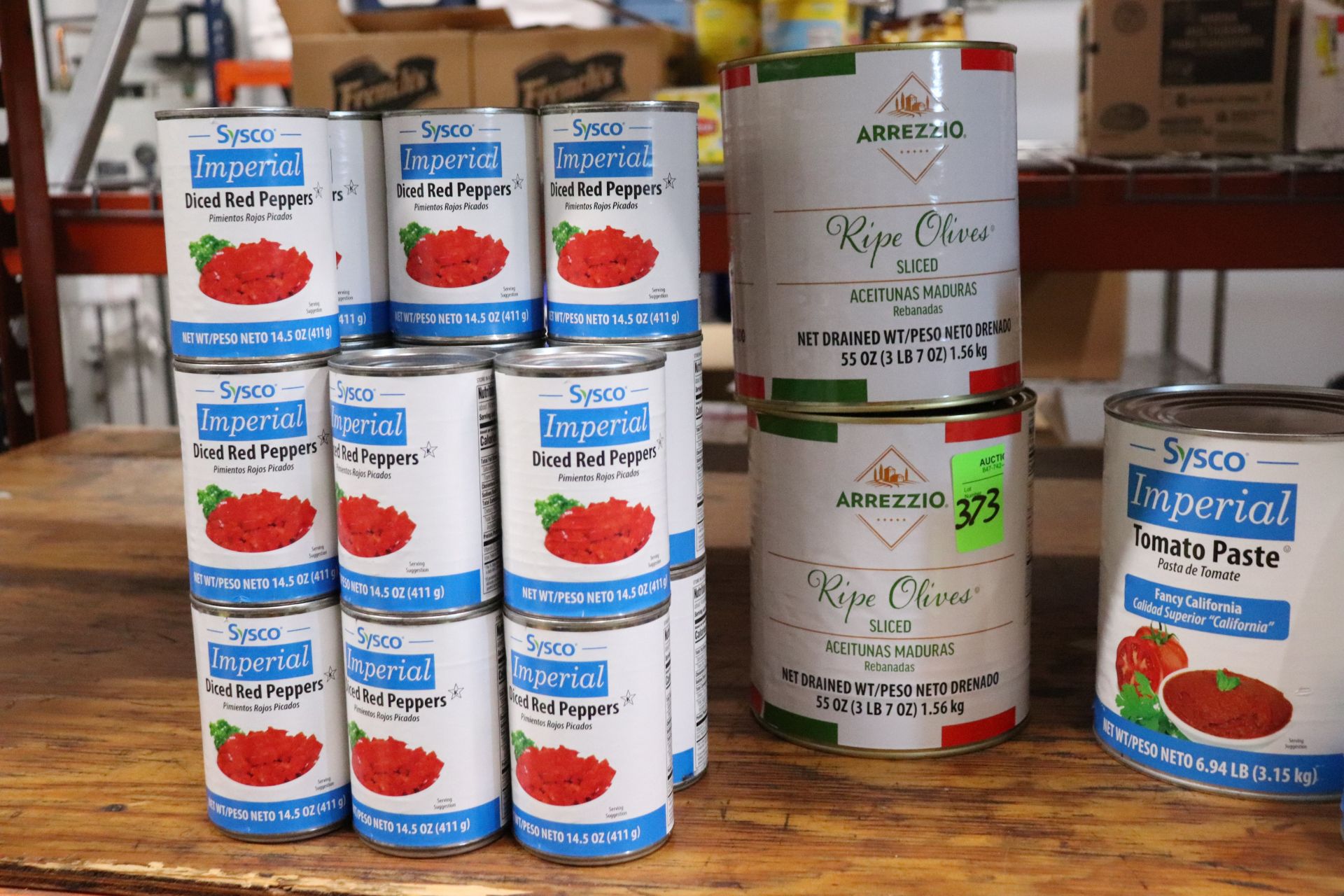 One shelf of canned food including ground tomatoes, chili sauce, diced red peppers, sliced olives, t - Image 8 of 8