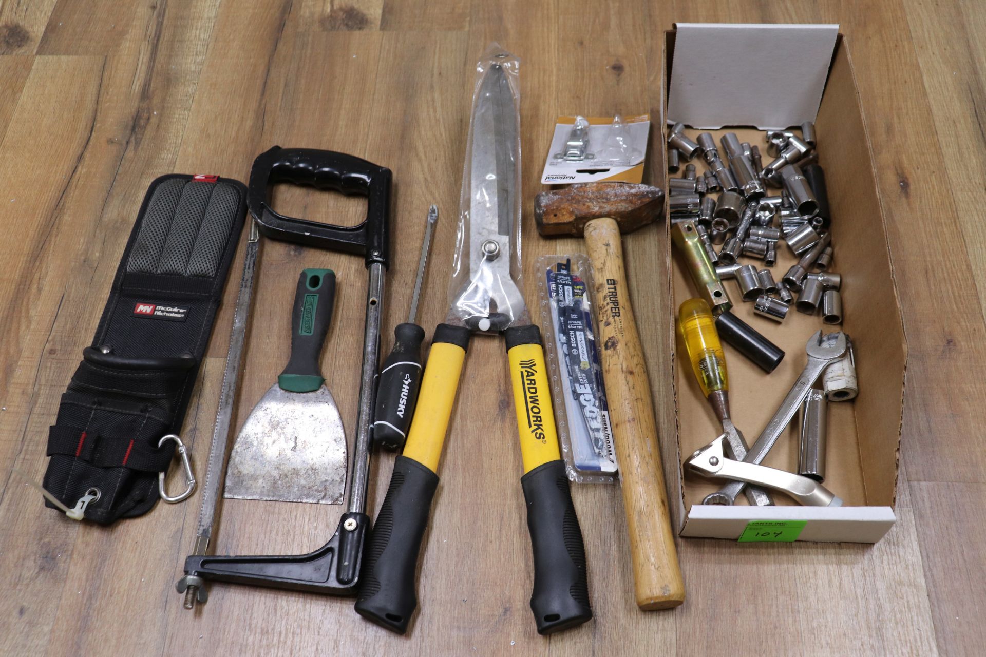 Miscellaneous sockets, hacksaw, mallet, and garden shears