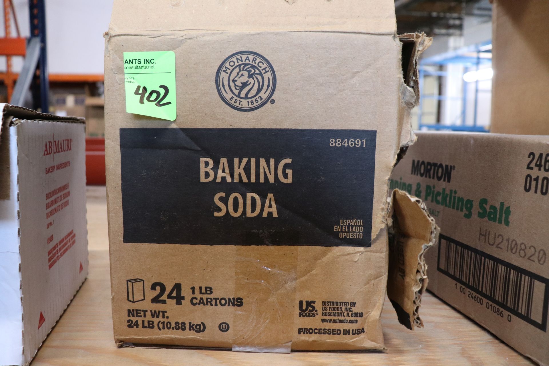 One case of baking soda containing twenty-four 1-lb boxes