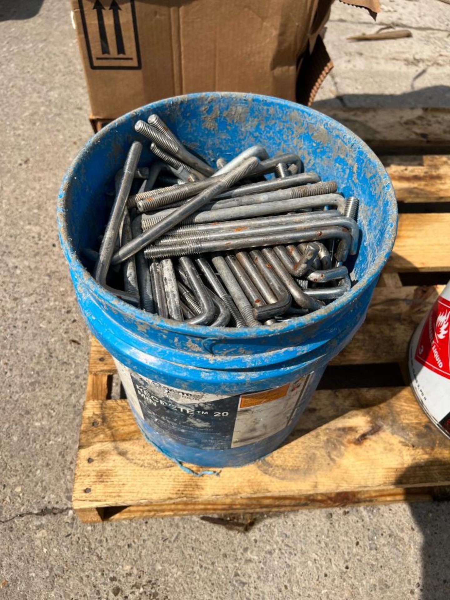 Bucket of Anchor Bolts. Located in Mt. Pleasant, IA