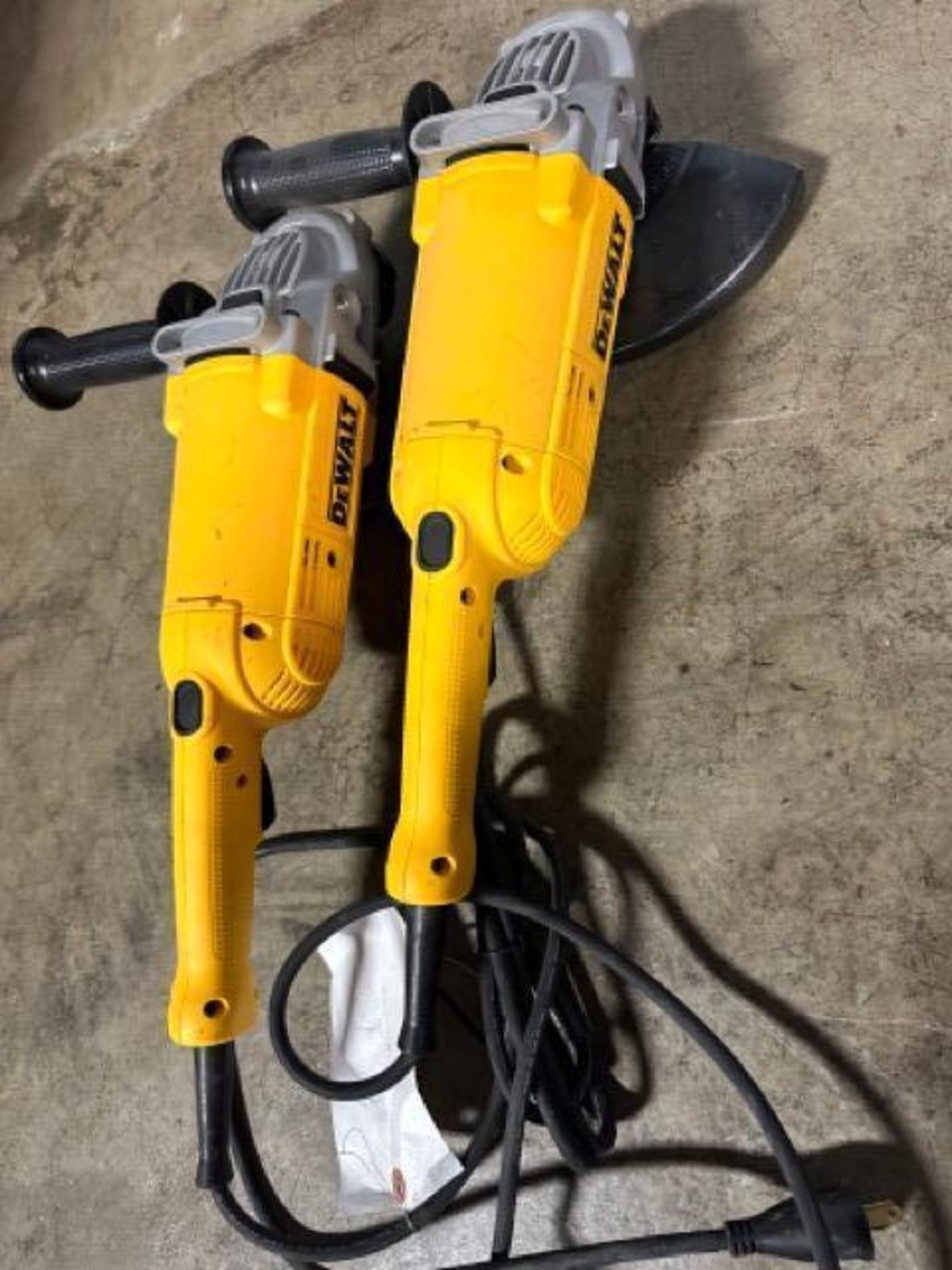 (2) DeWalt DWE4519 9" angle grinder