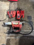 Milwaukee cordless M12 grease gun with one battery and charger