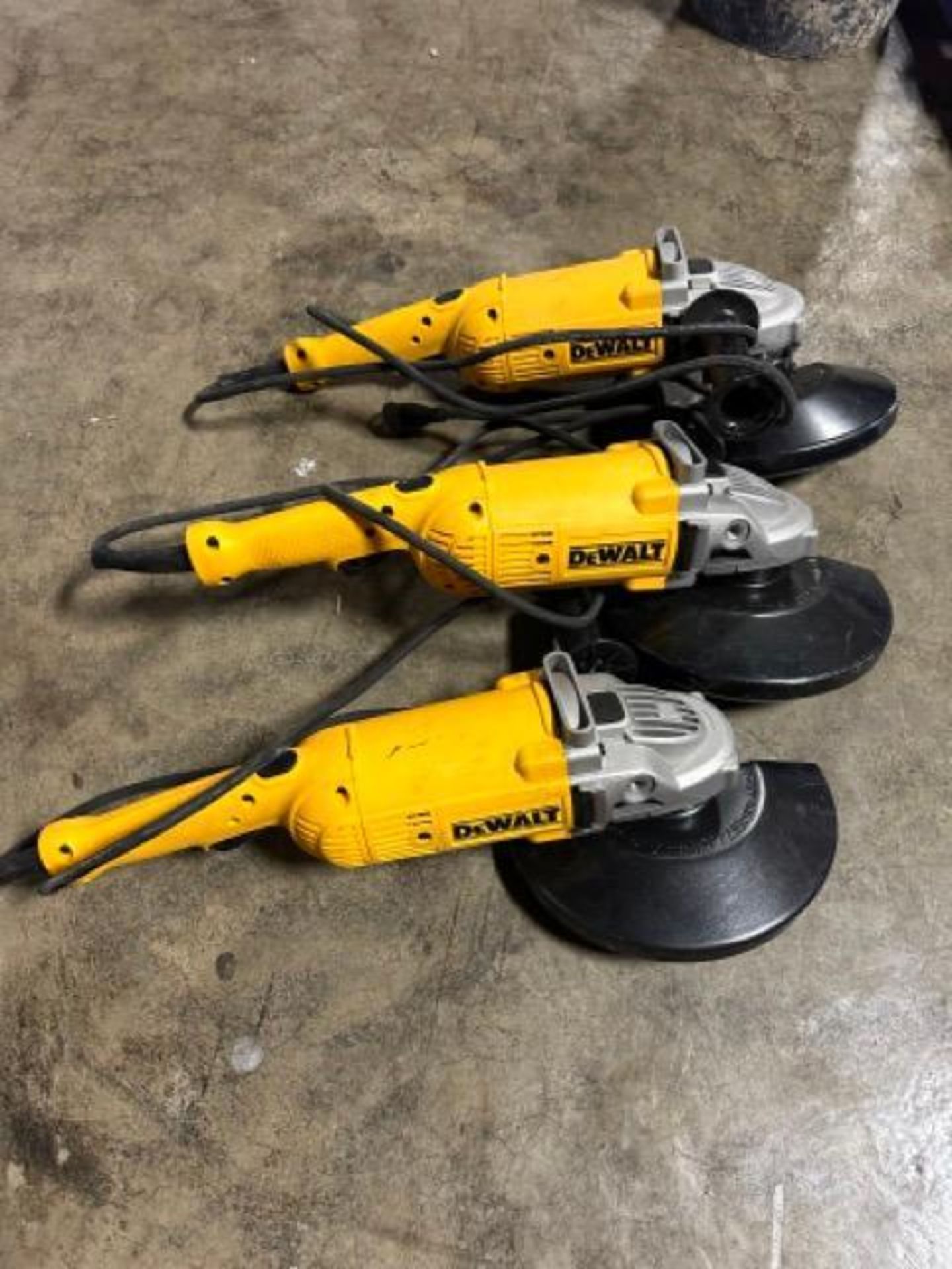 (3) DeWalt DWE4519 9" angle grinder