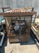 Metal cage with concrete pump accessories to include steel pipe, concrete pump hose, clamps, o-