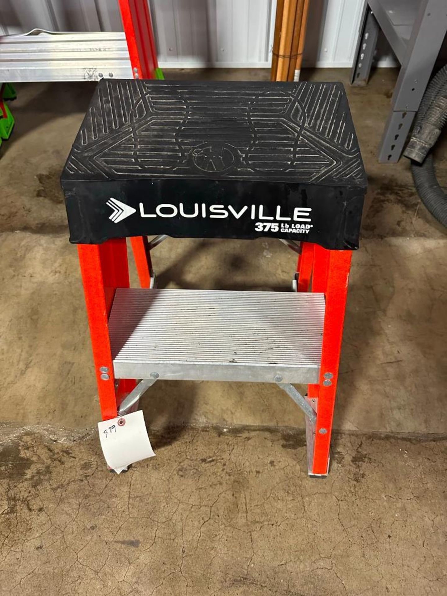 Louisville 2' step ladder, model FY8002, located in Mt. Pleasant, IA.