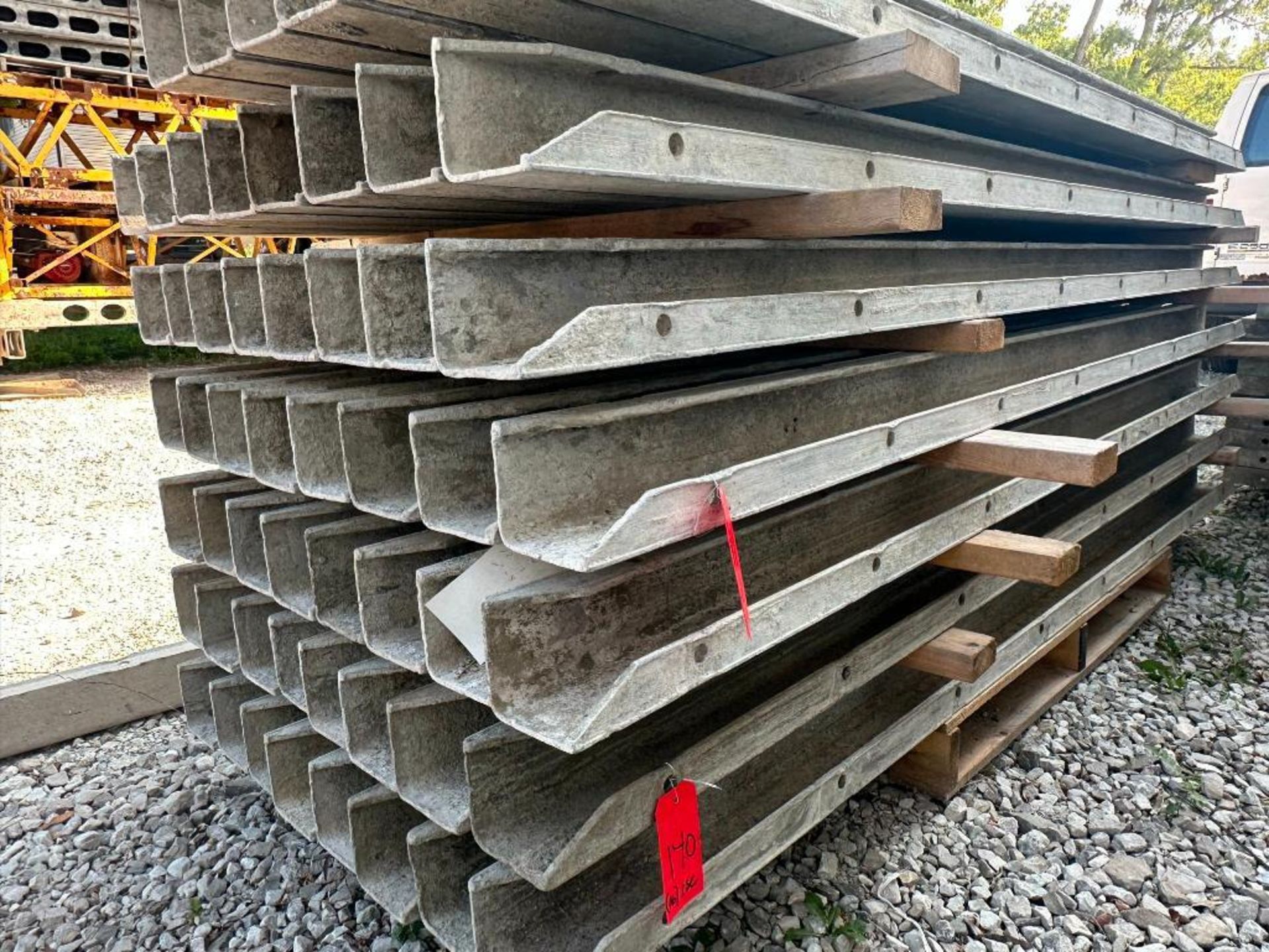 (16) 4" x 4" x 8' ISC Wall-Ties aluminum concrete forms, smooth, 6-12 hole pattern, located in Mt.