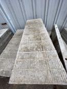 (9) 16" x 4' Western aluminum concrete forms, Vertex brick, 6-12 hole pattern. Located in