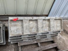 (4) 4' Wrap Western aluminum concrete forms, Vertex brick, 6-12 hole pattern. Located in Hopedale,