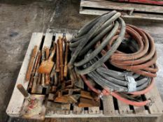 Pallet of breaker bars, bucket teeth & air hose. Located in Mt. Pleasant, IA.