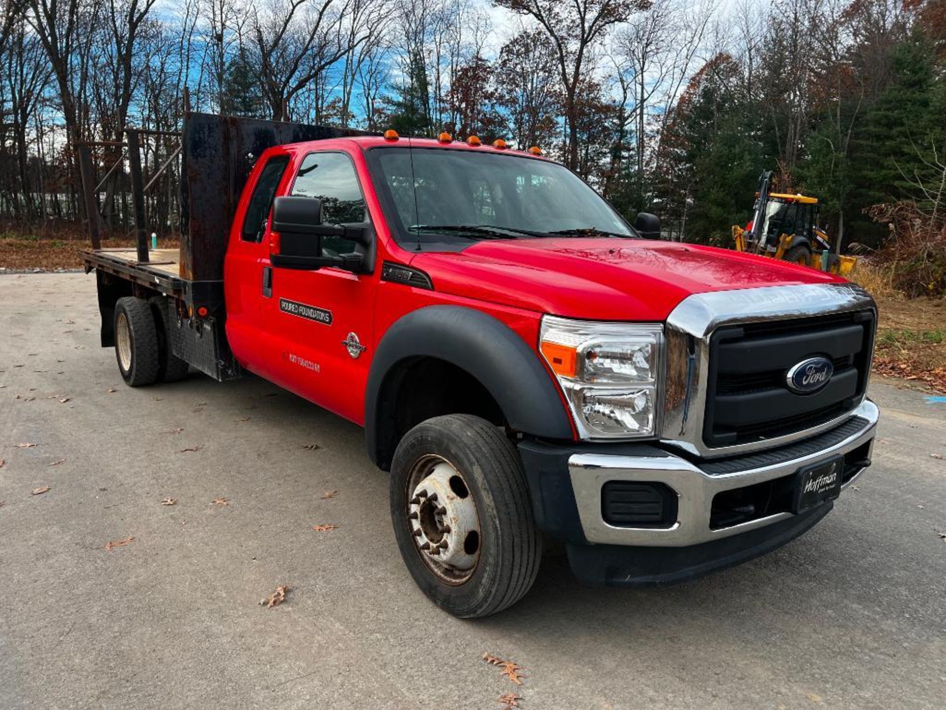 2016 Ford F550 Super Duty Power Stroke 6.7L truck, 4x4, dually, 98,306 miles, 8' x 12' flatbed, VIN: