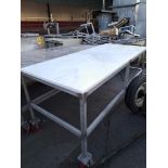 Portable Stainless Steel Table, poly top, 3' W X 7' L X 38" H,: Required Loading Fee $75.00,