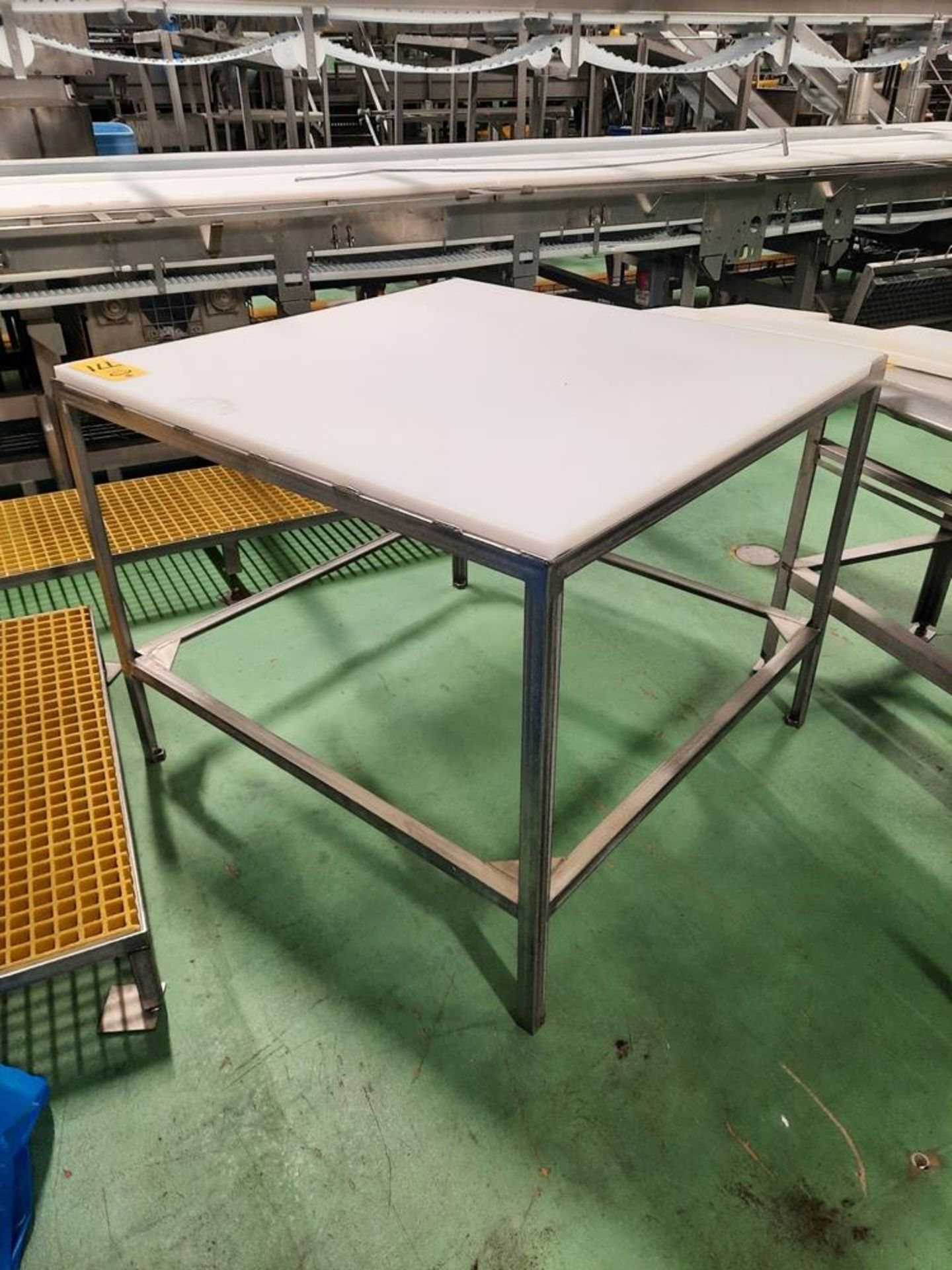 Stainless Steel Table, 4' W X 4' L X 39" T, poly top: Required Loading Fee $50.00, Rigger-Norm