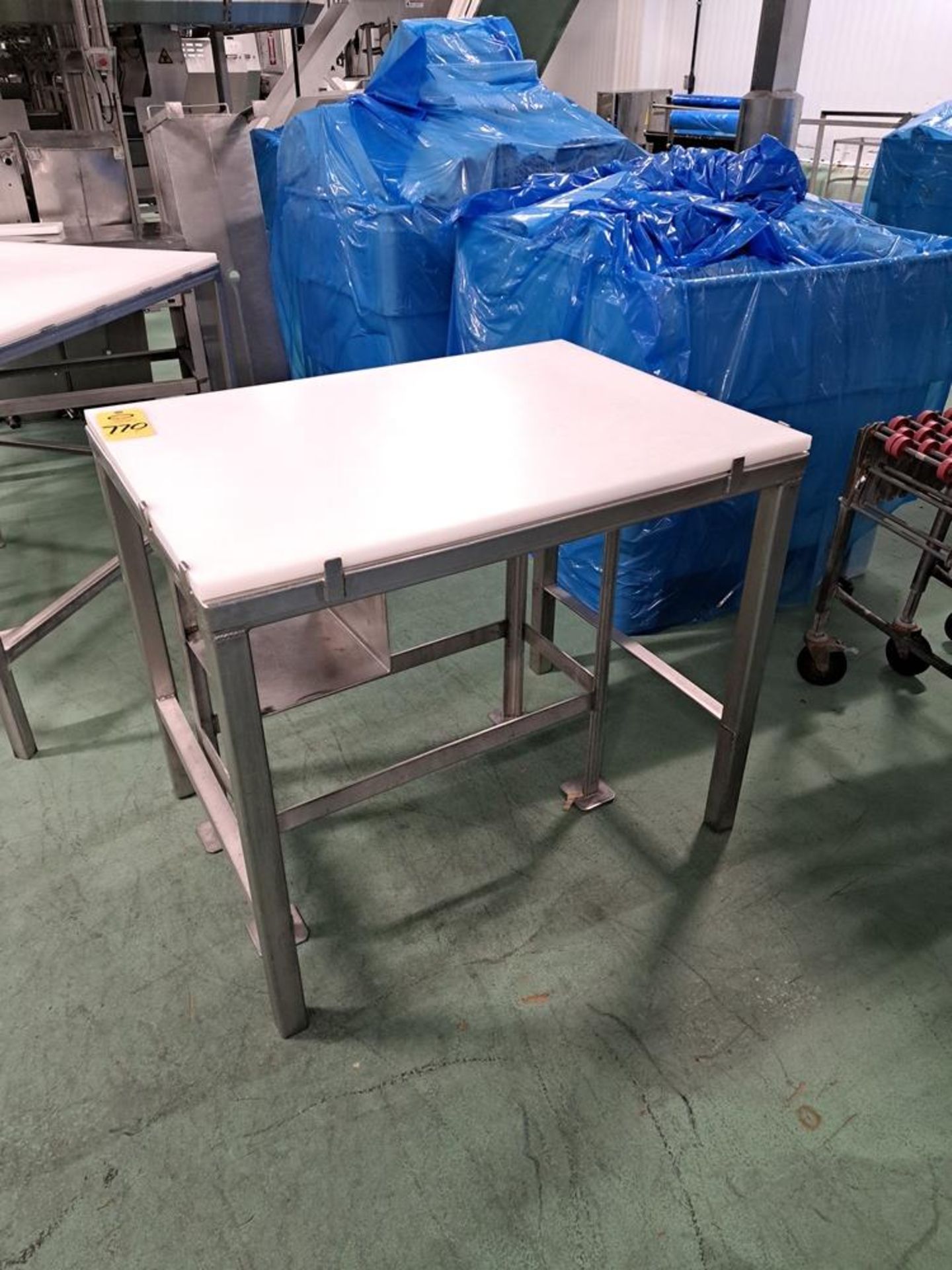 Stainless Steel Table, 30" W X 42" L X 36" T, poly top: Required Loading Fee $50.00, Rigger-Norm