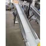 Stainless Steel Incline Conveyor, 12" W X 12' L infeed, 65" discharge, belts have been added to
