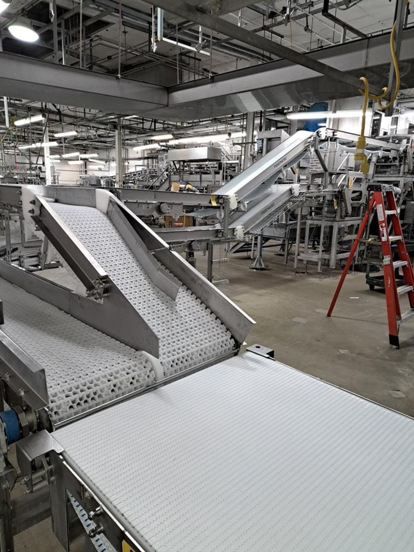 Frontmatec Stainless Steel Double Incline Conveyor, 45º turn, 16" W X 29' L bottom conveyor, 16" W X