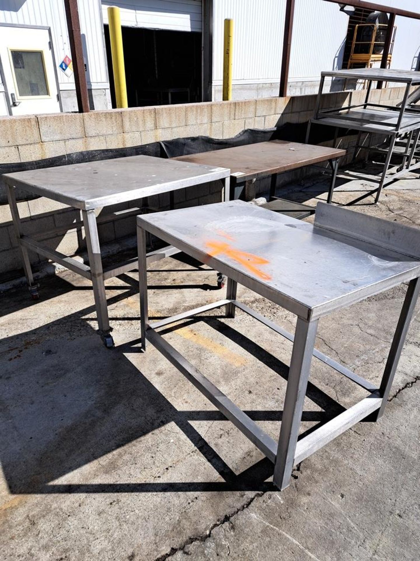 Stainless Steel Table, 29" W X 42" L X 34" T, (1) 30" W X 4' L X 37" T: Required Loading Fee $75.00,