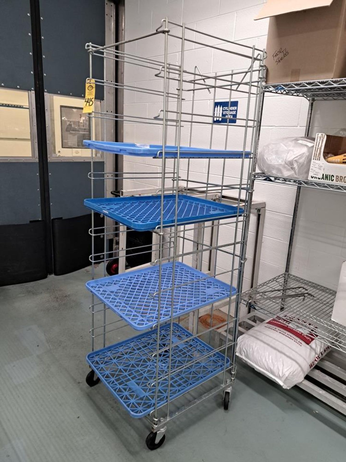 Stainless Steel Cart, 24" W X 26" L X 76" T with (4) 21 1/2" W X 27" L plastic trays-Removal Is By