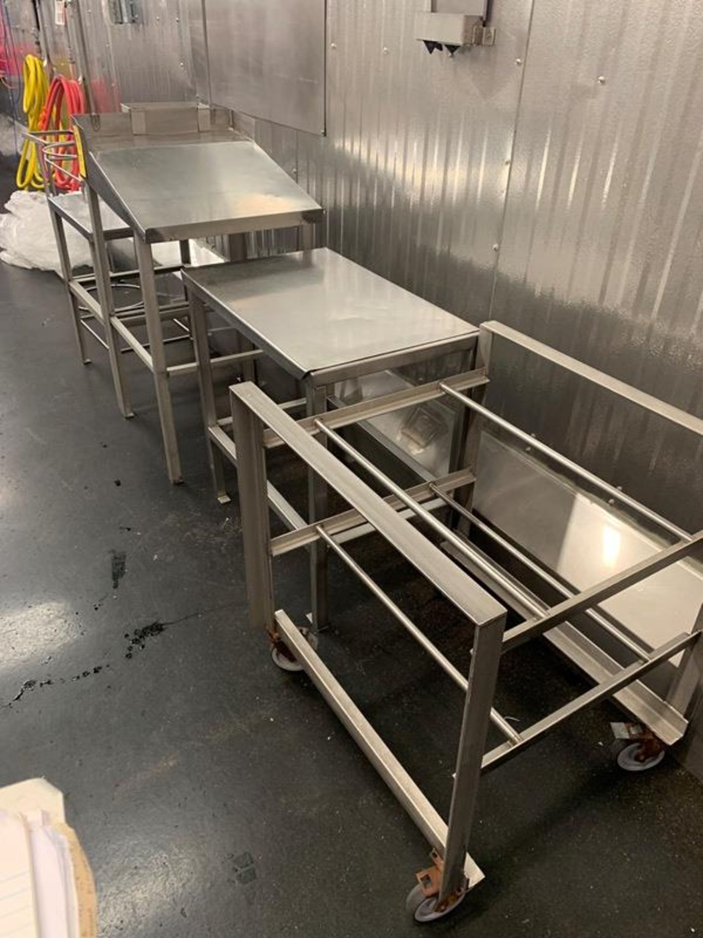 Lot (2) Tables, Forman's Desk, (4) Racks (Located in Mt. Pleasant, IA)-ALL EQUIPMENT MUST BE REMOVED