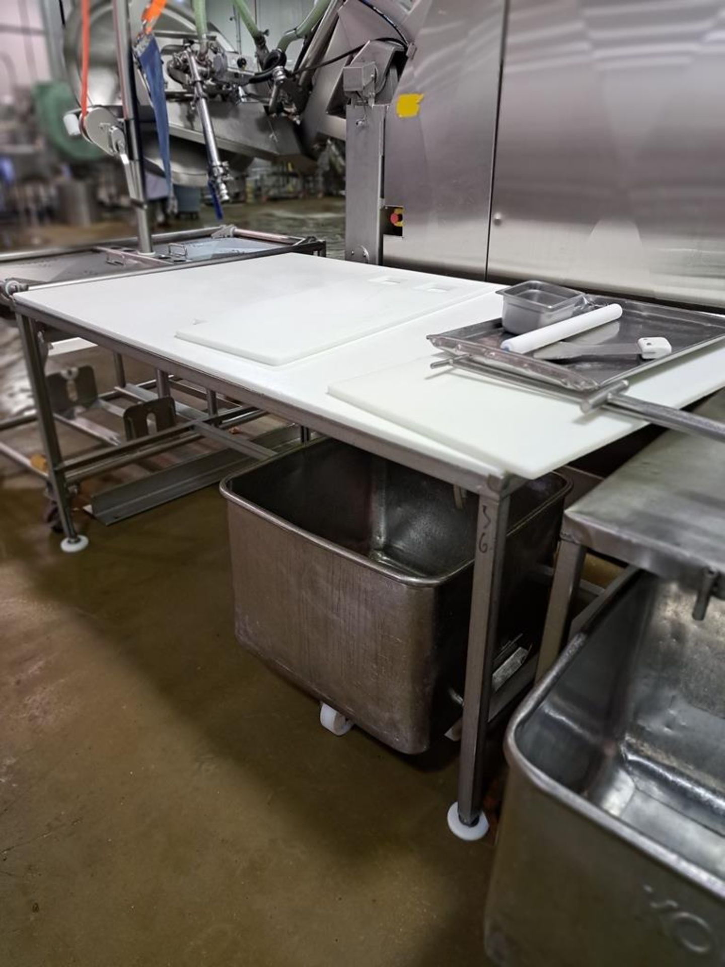 Stainless Steel Table with poly top, 4' W X 7' L X 37" T (Located in Bolingbrook, IL)(Loading Fee $