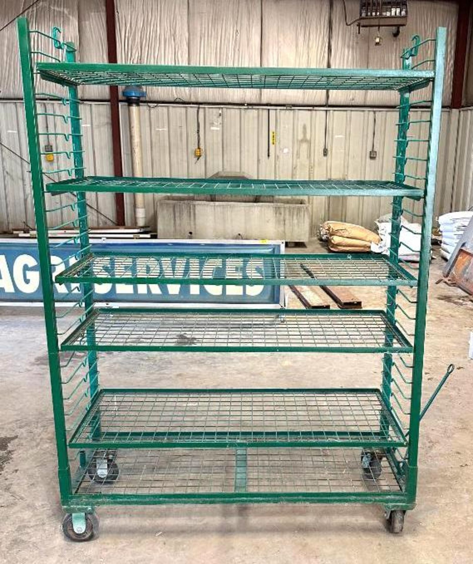 6-TIER HEAVY DUTY SHELVING RACK ON CASTERS SIZE: 60" X 21" X 80" LOCATION: MAIN WAREHOUSE