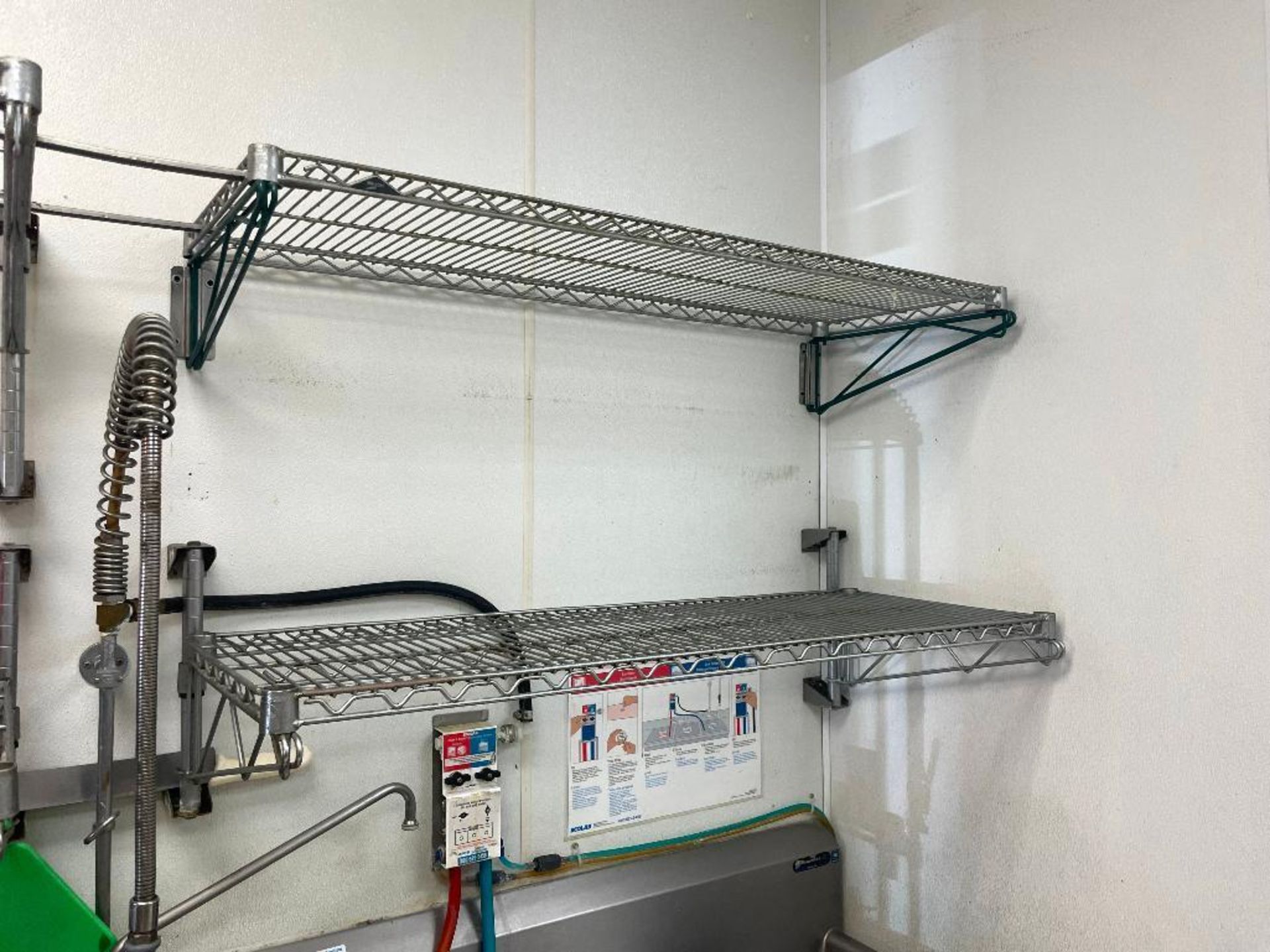 DESCRIPTION: (4) 48" X 18" WALL MOUNTED WIRE SHELVES SIZE 48" X 18" LOCATION: 4811 E. Grant Rd THIS