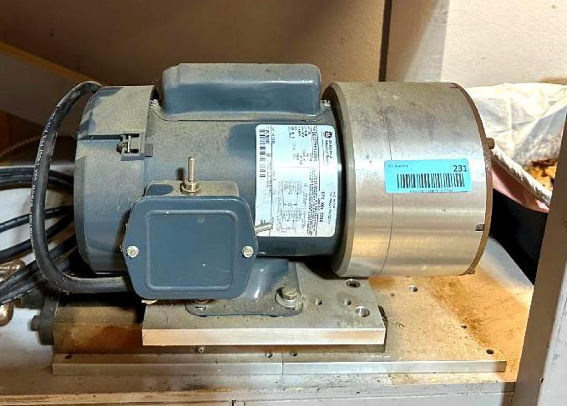 AC MOTOR BRAND/MODEL: GE 5KC37NN322GX INFORMATION: 3/4 HP, 115/230V, FR56 LOCATION: GARAGE QTY: 1