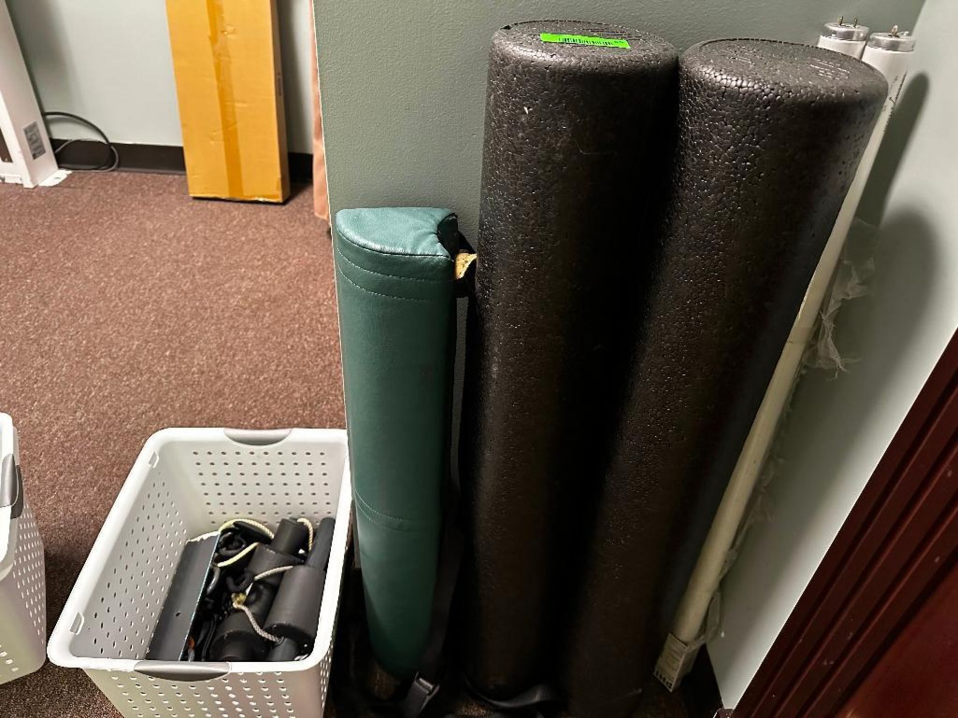 DESCRIPTION: (3) FOAM ROLLERS AND (1) TRACTION DEVICE. LOCATION: XRAY ROOM THIS LOT IS: ONE MONEY QT