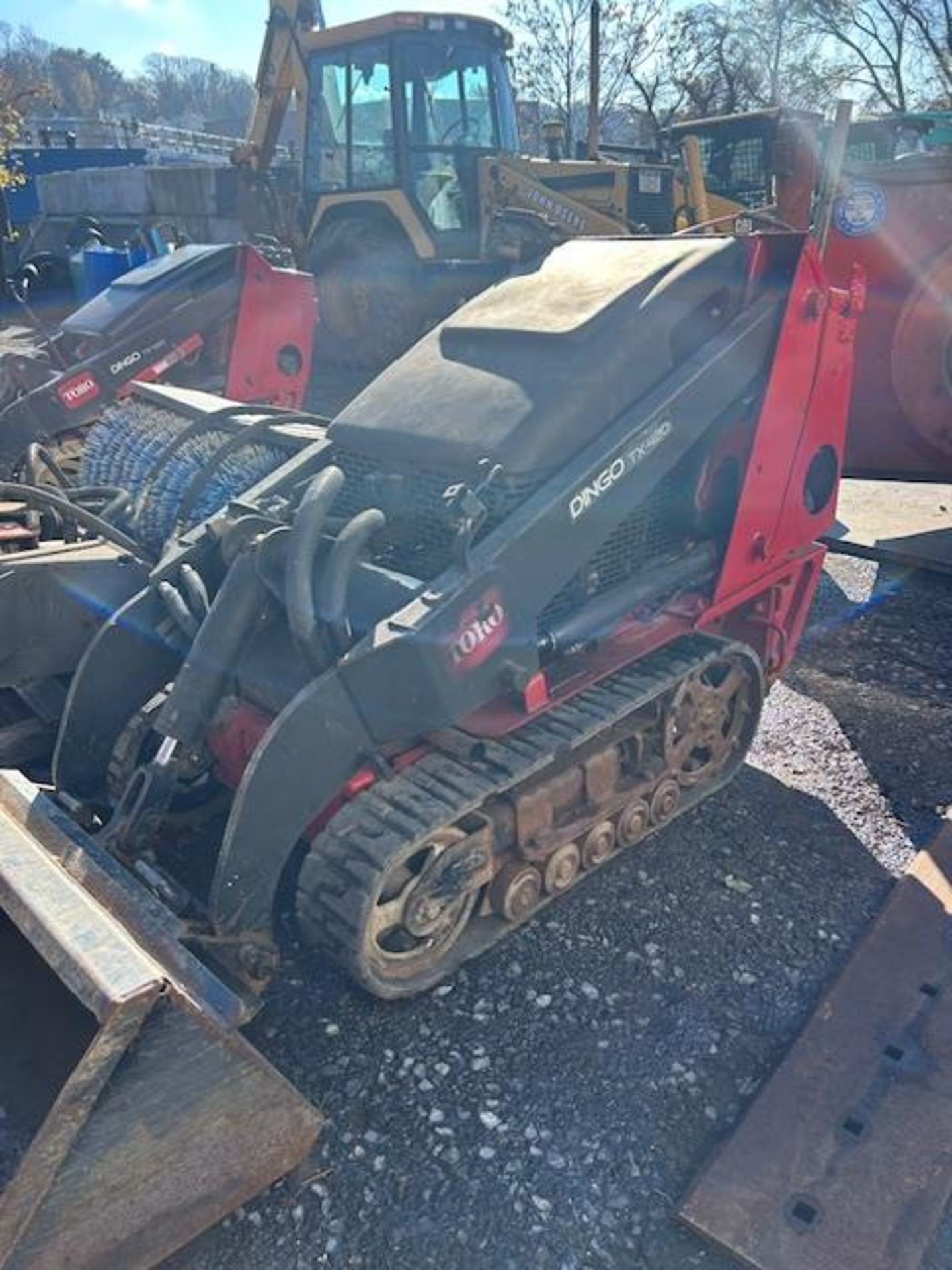 Toro Dingo TX-420 Compact Utility Loader with Extra Plow & Bucket - Image 5 of 6