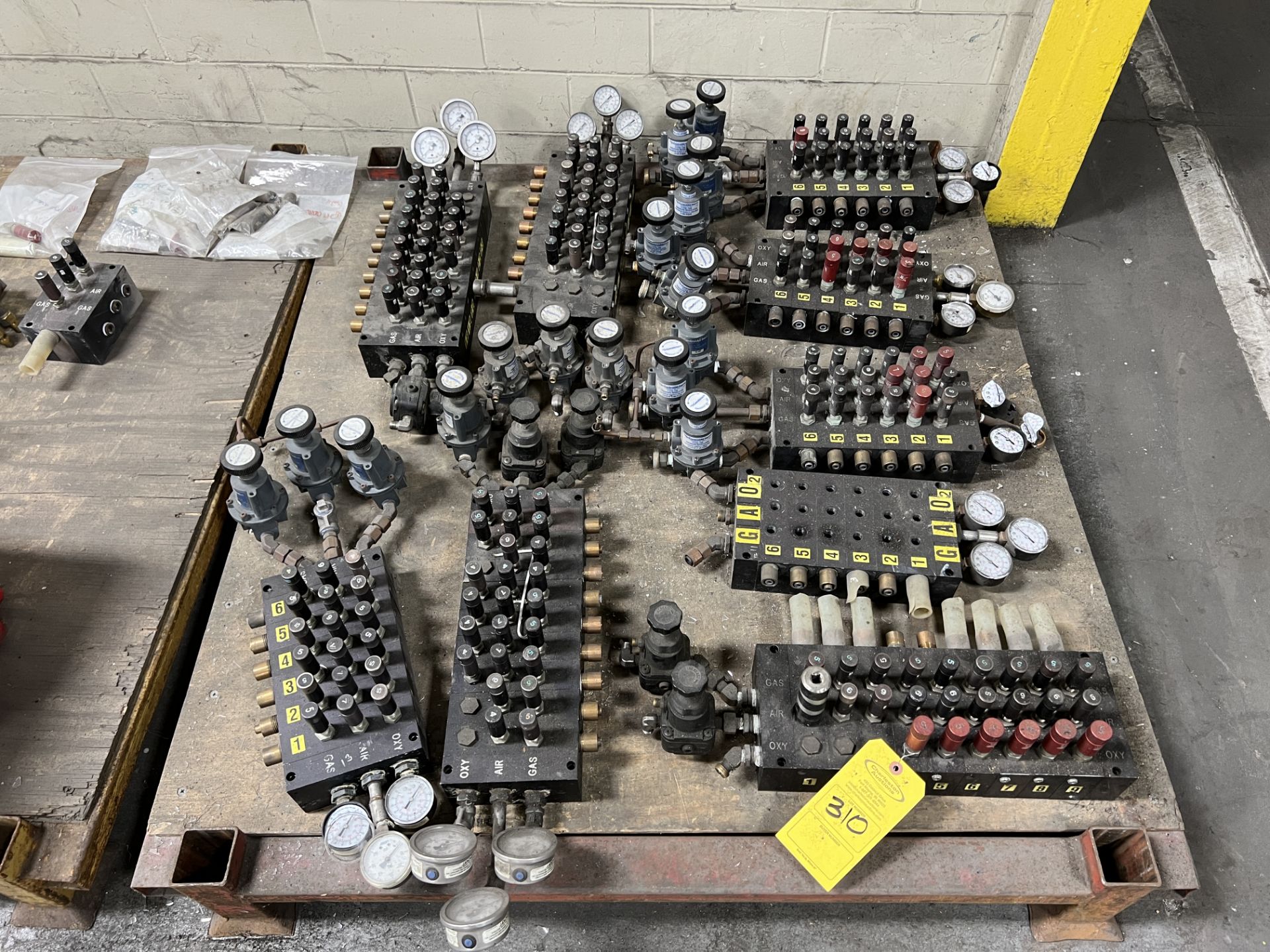 PALLET WITH (9) MANIFOLDS WITH ASHCROFT GAUGES AND CONTROL AIR VALVES