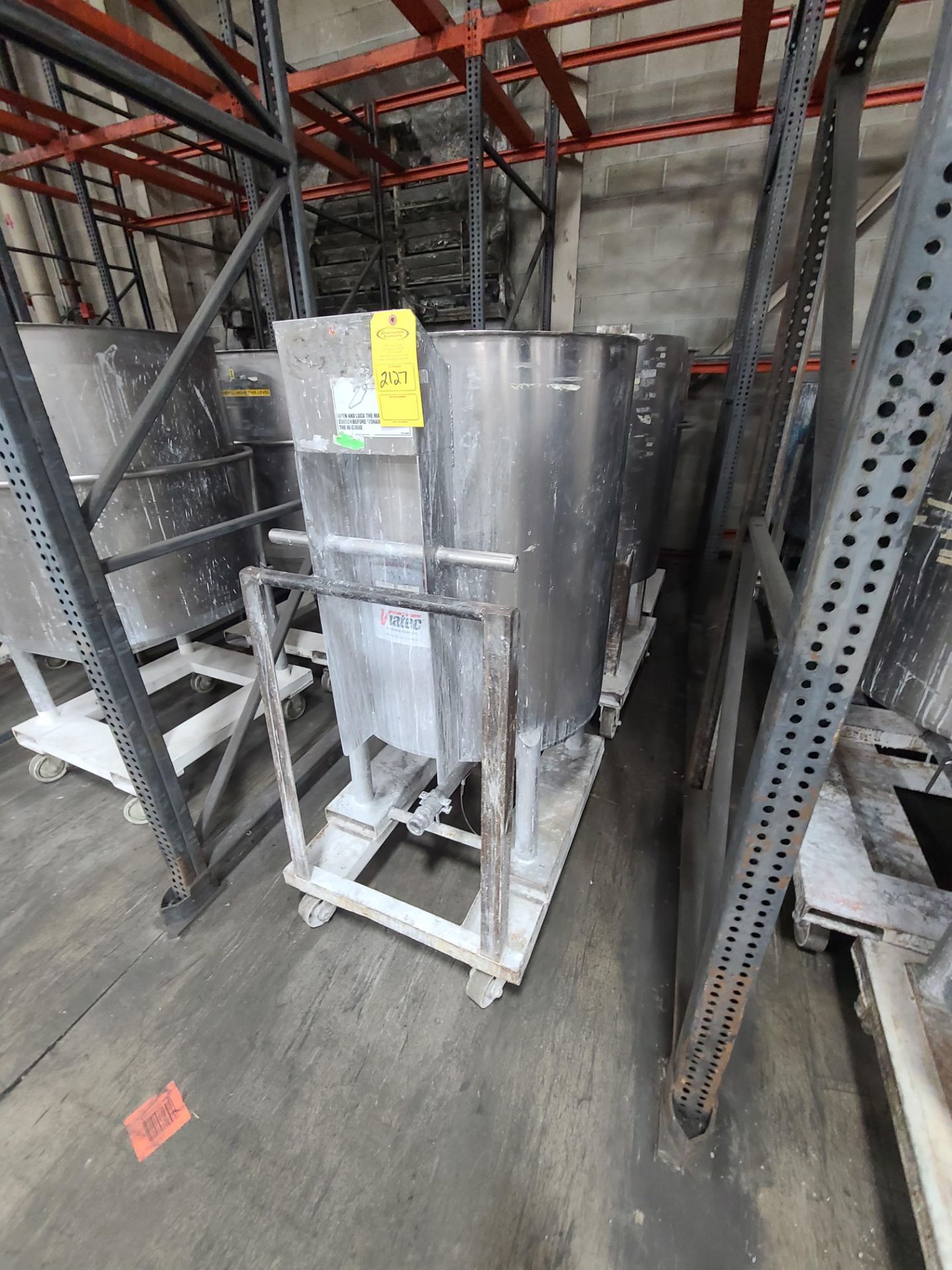 (4) STAINLESS STEEL MIXING TANKS 100-125 GALLON