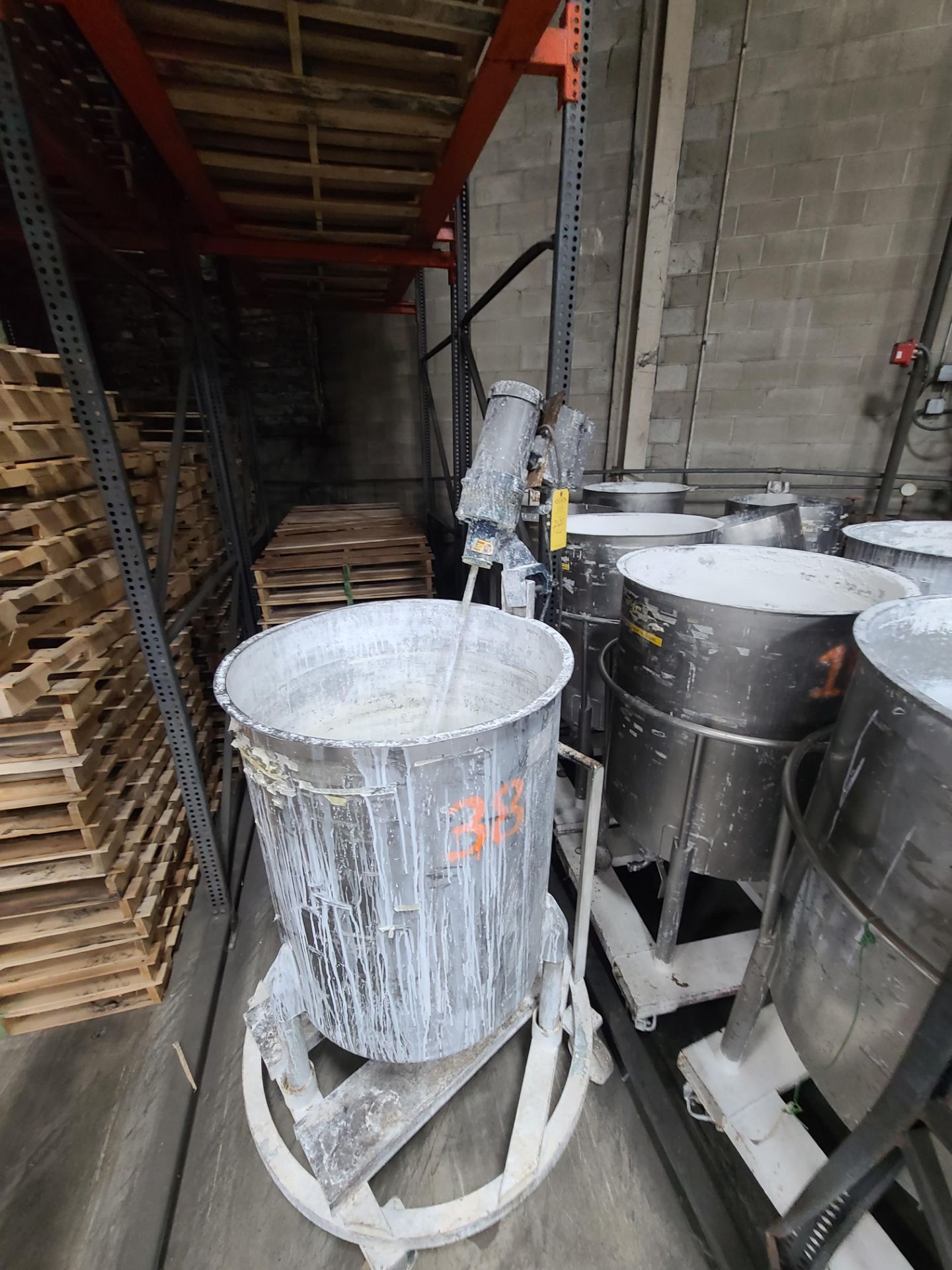 (4) STAINLESS STEEL MIXING TANKS 100-125 GALLON