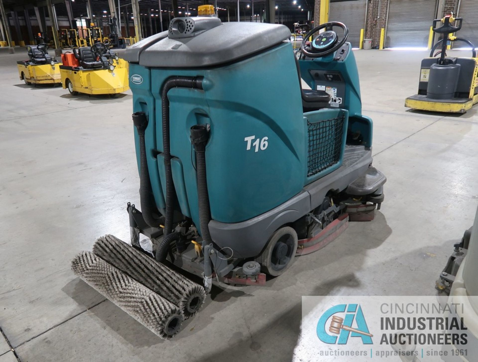 TENNANT MODEL T16 ELECTRIC SIT DOWN FLOOR SCRUBBER; S/N 27316, WITH 36 VOLT CHARGER, HOURS N/A - Image 4 of 11