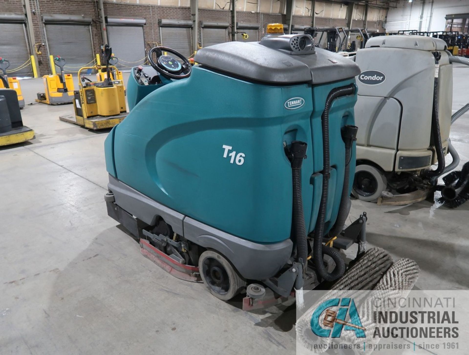 TENNANT MODEL T16 ELECTRIC SIT DOWN FLOOR SCRUBBER; S/N 27316, WITH 36 VOLT CHARGER, HOURS N/A - Image 6 of 11