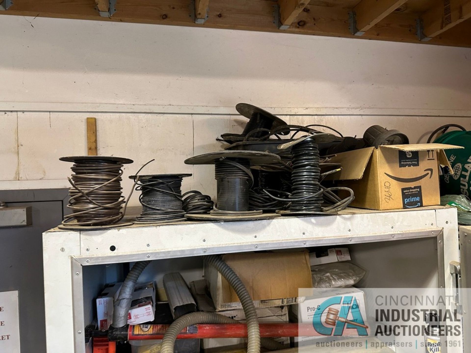 (LOT) MISCELLANEOUS PVC COUPLINGS AND CONNECTORS SPOOLED WIRE AND IRRIGATION HARDWARE WITH STORAGE - Image 9 of 14