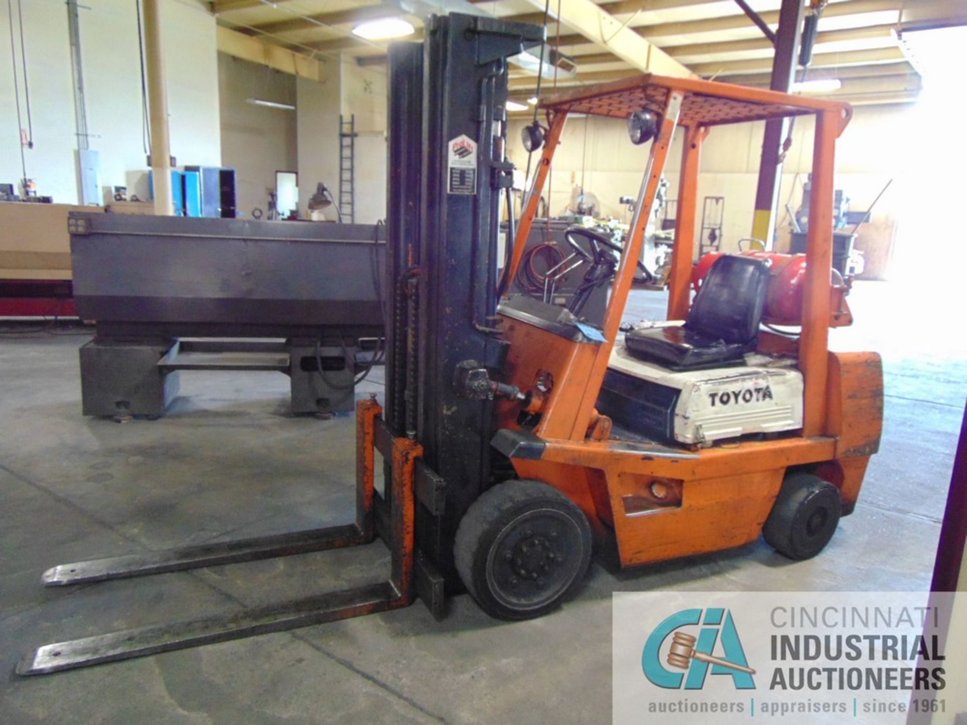 6,000 LB. TOYOTA MODEL FGC30 LP GAS SOLID TIRE LIFT TRUCK; S/N 10358, 169" LIFT HEIGHT, 48" FORKS,