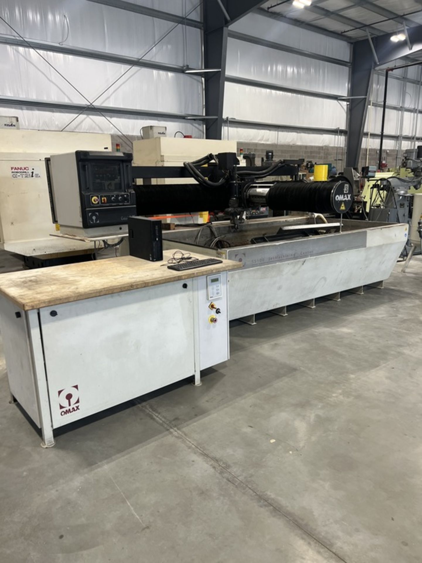 4' X 8' OMAX 55100 WATERJET; S/N B512079, 100" X-AXIS, 55" Y-AXIS, 8" Z-AXIS, 60,000 PSI (NEW 2007)