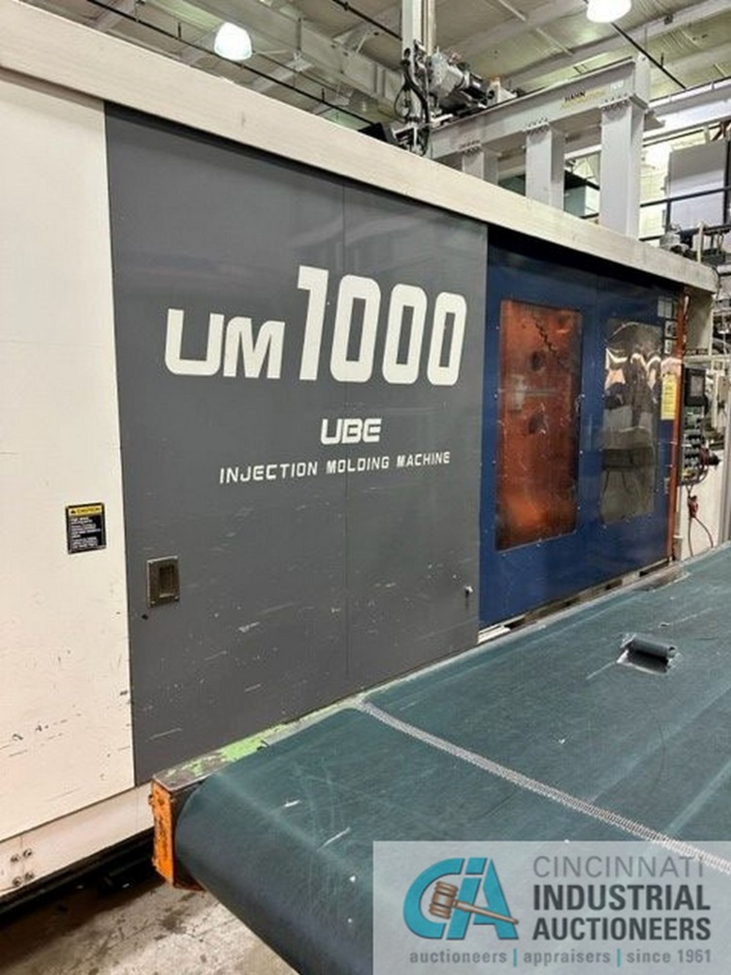 1,000 TON X 185 OZ. UBE MODEL UM-1000 PLASTIC INJECTION MOLDER- Subject to bid confirmation