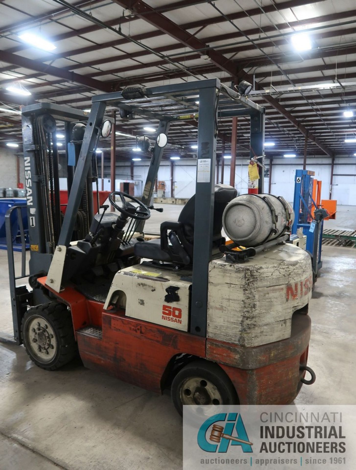 5,000 LB. NISSAN MODEL 50 LP GAS CUSHION TIRE THREE STAGE MAST FORKLIFT; S/N CPJ02A25PV, 178" MAX - Image 3 of 11