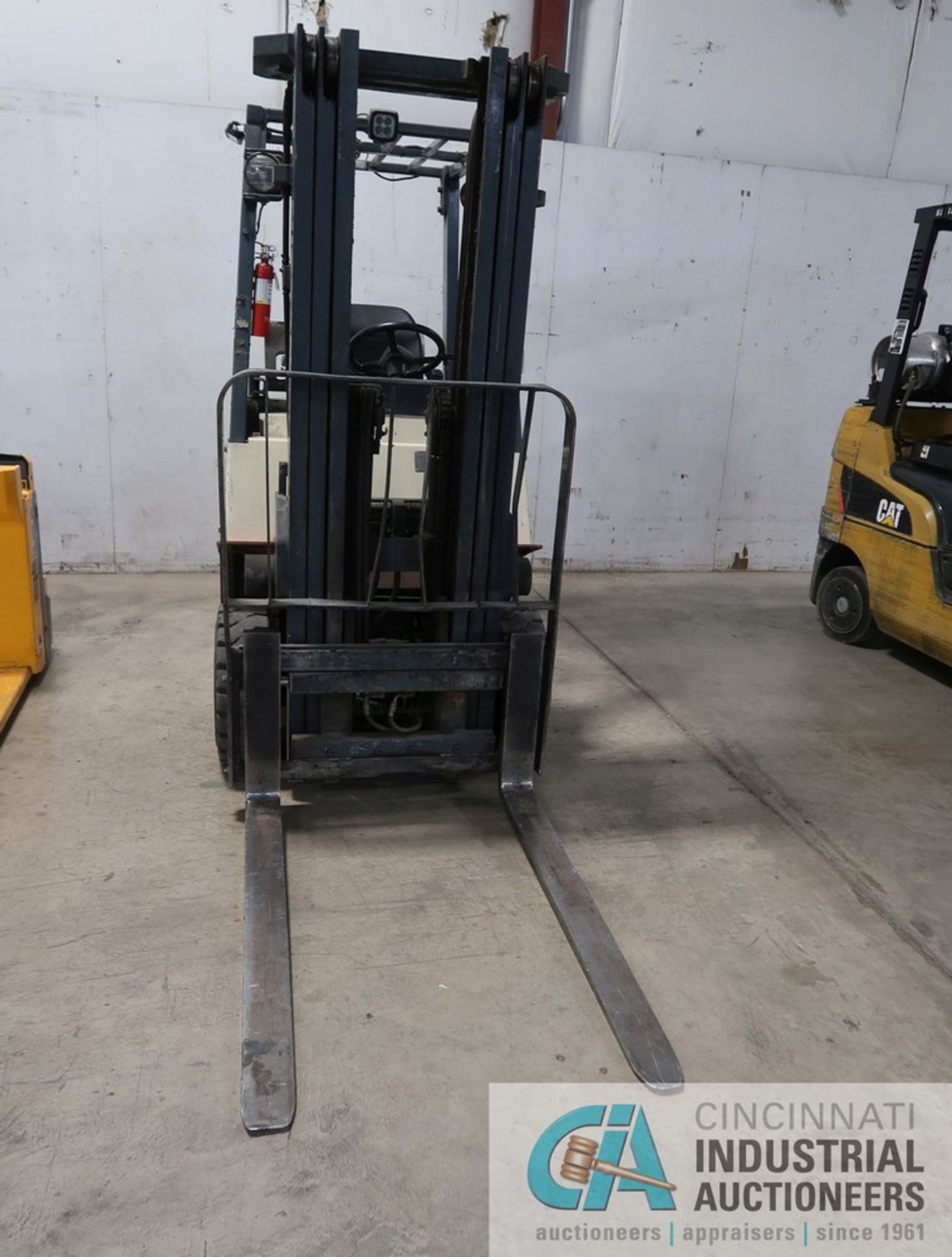 5,000 LB. NISSAN MODEL 50 LP GAS CUSHION TIRE THREE STAGE MAST FORKLIFT; S/N CPJ02A25PV, 178" MAX - Image 6 of 11