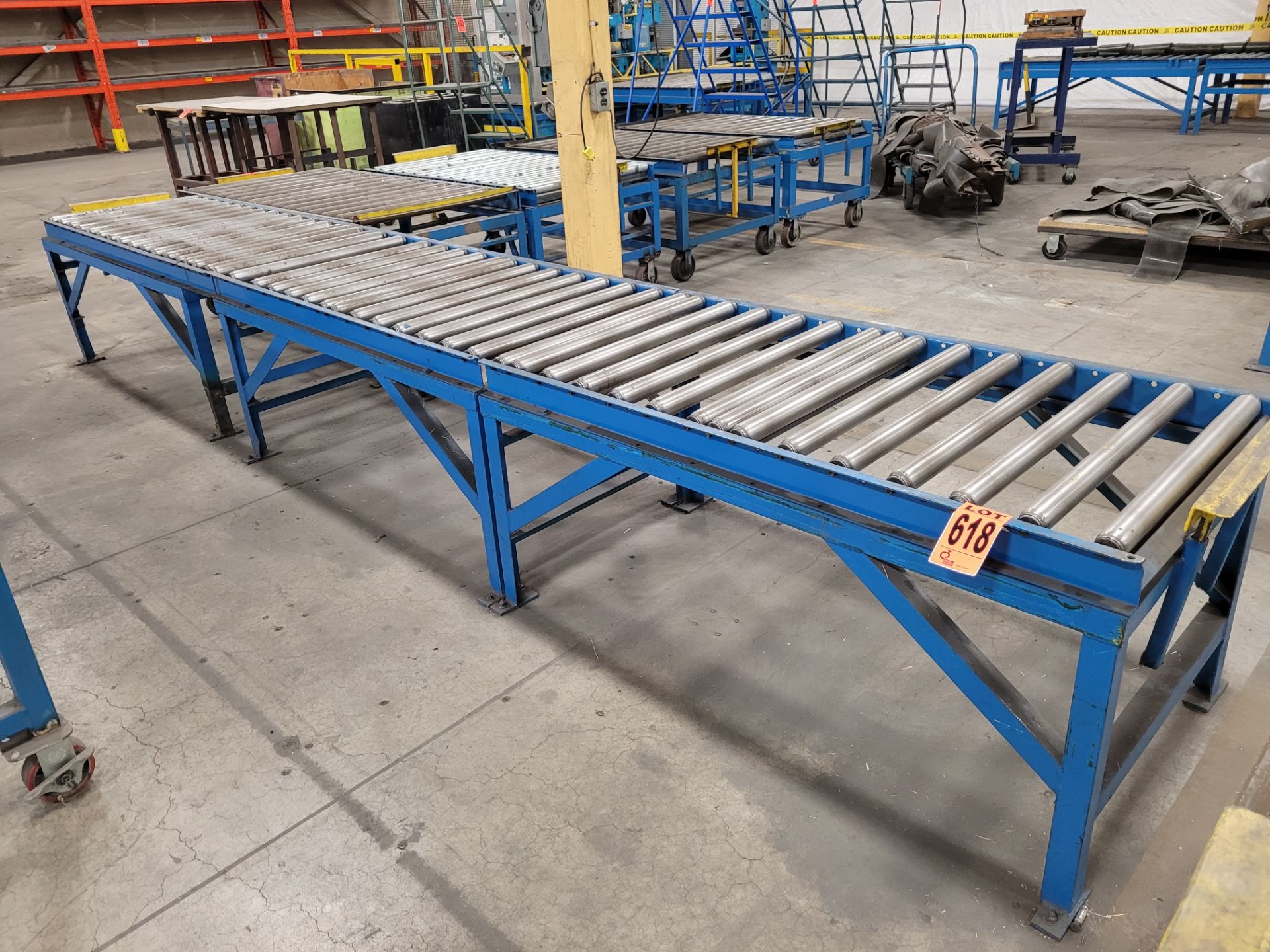 Lot of (3) steel frame manual roller conveyors, (2) w/ adjustable steel backstops