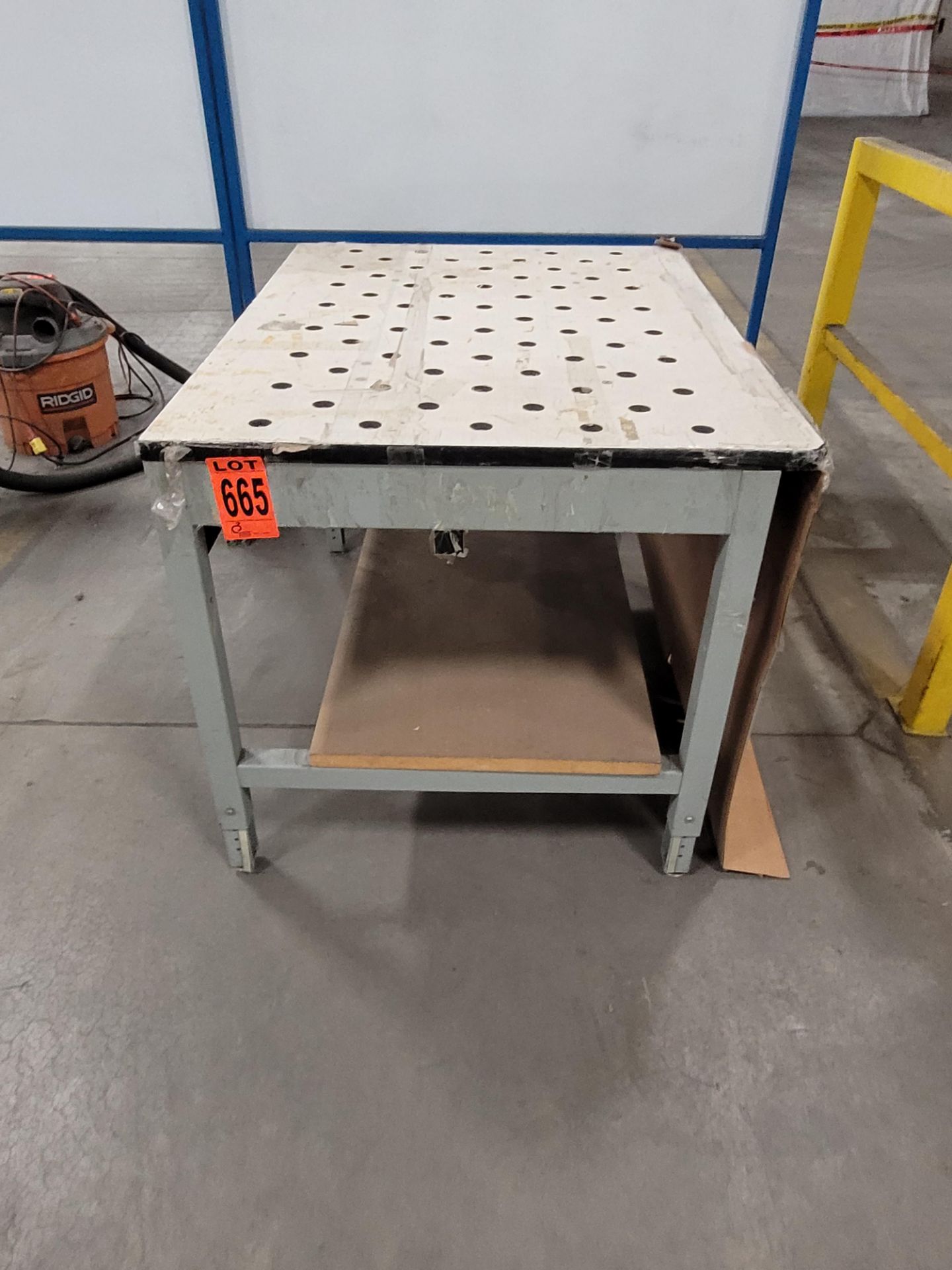 Steel frame table w/ specialty plywood surface w/ ball cut-outs