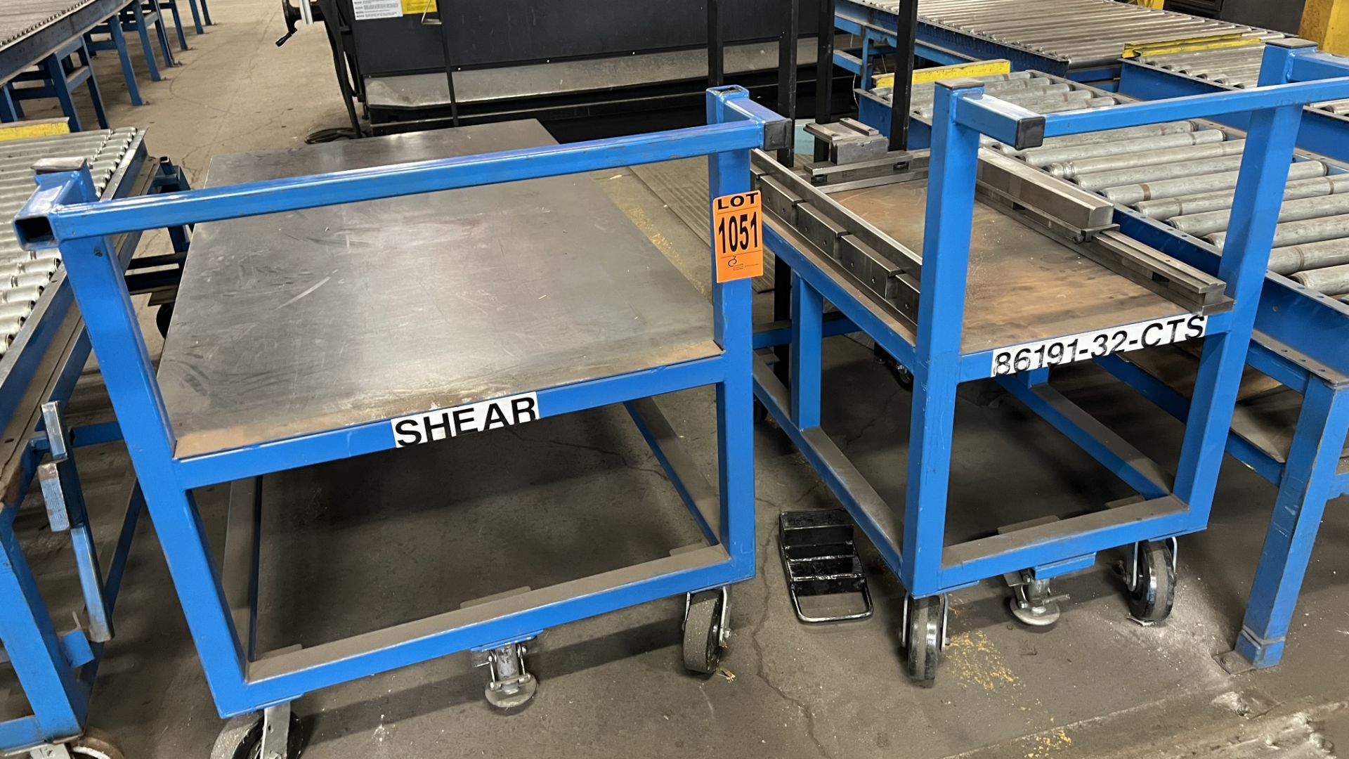 Lot of (2) steel frame platform carts on casters w/ foot lock, handle