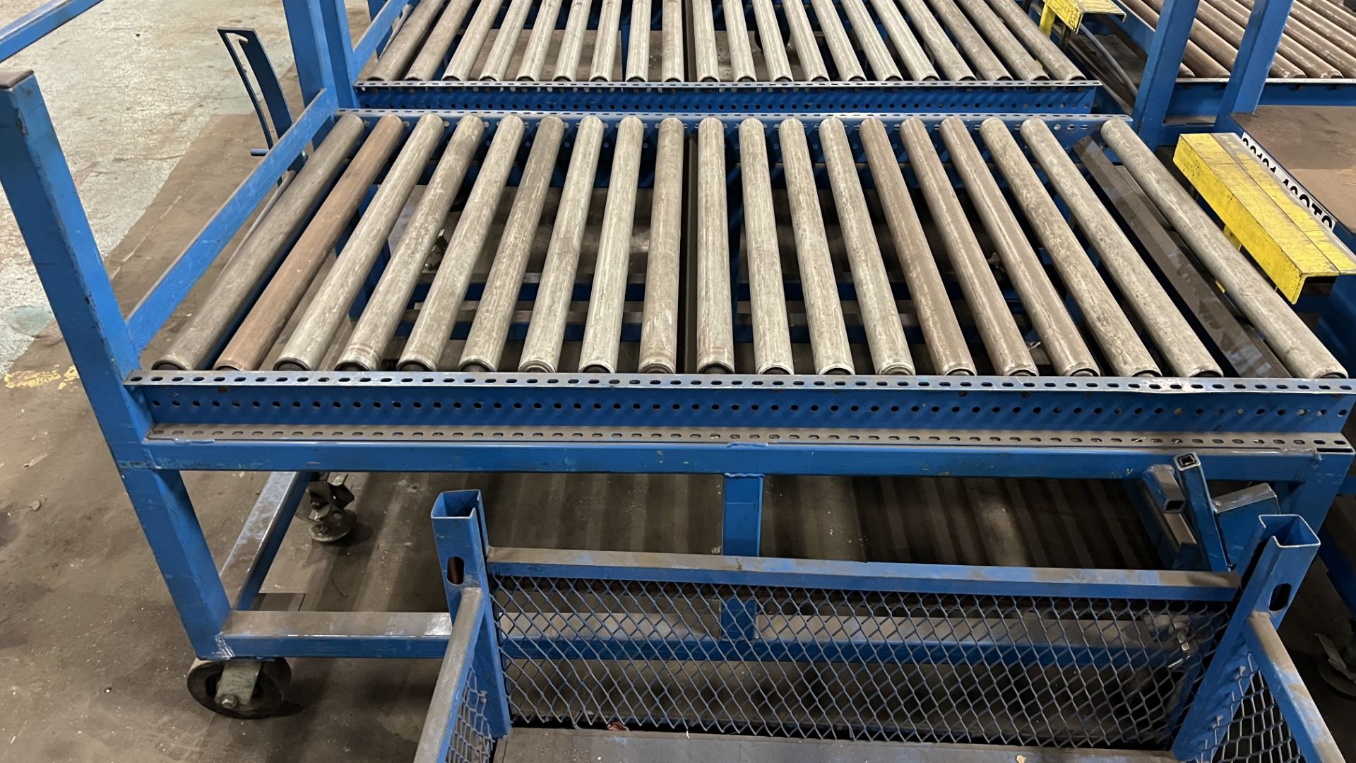 (1) section of steel frame mobile manual roller conveyor cart on casters w/ foot lock, handle and ad