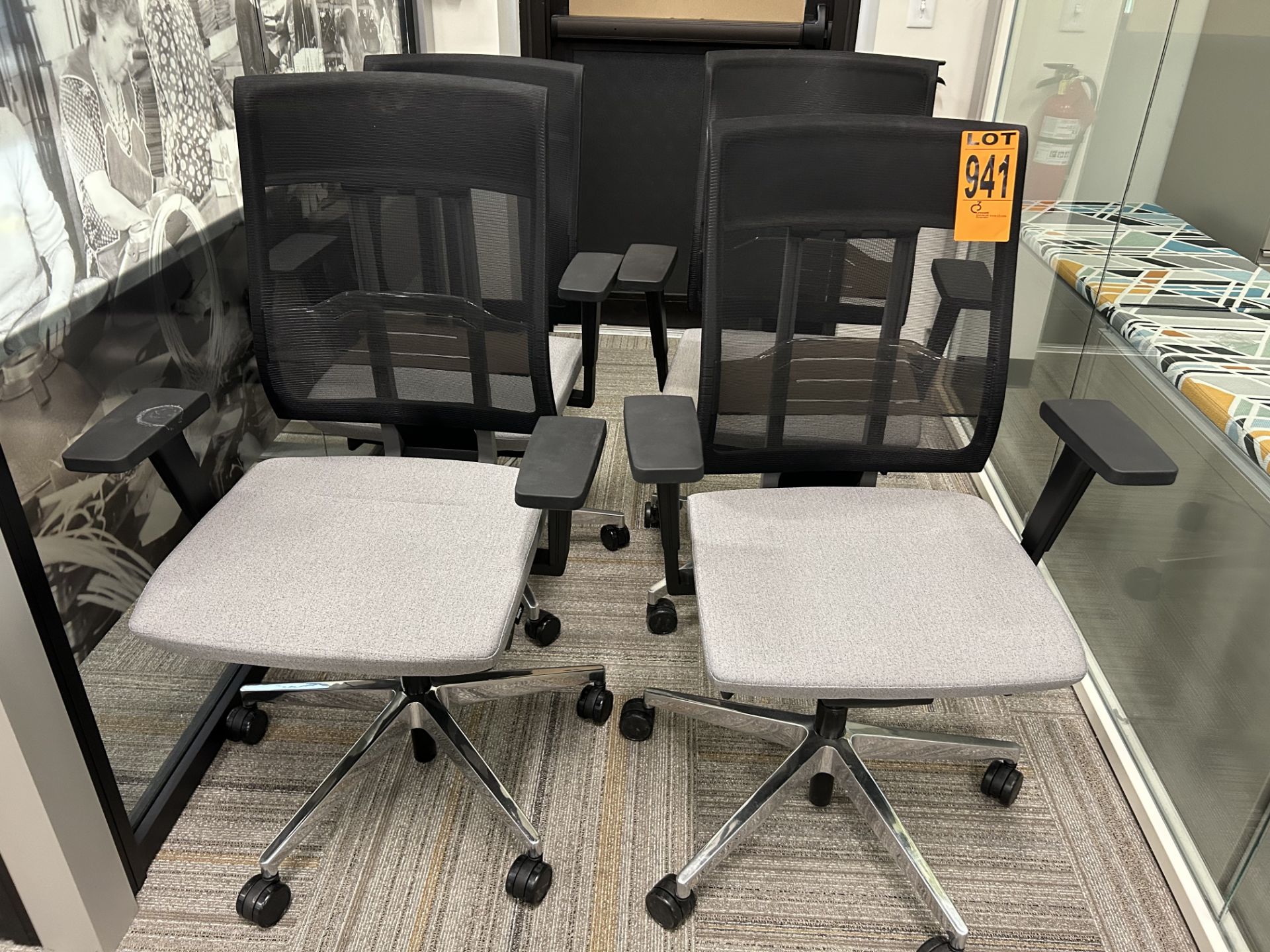 Lot of (4) adjustable executive mesh-back rolling office chairs