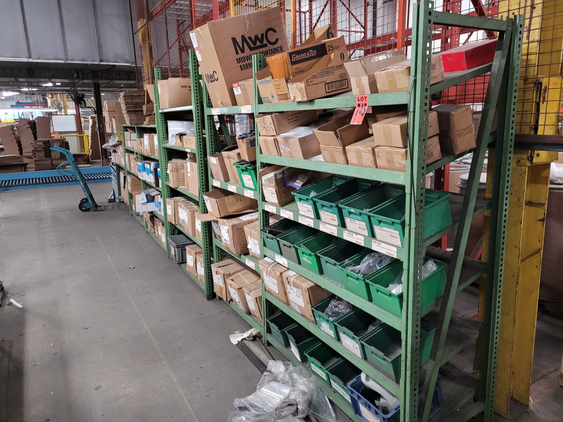 Lot of (6) sections of inclined racks, (8) uprights, (25) shelves