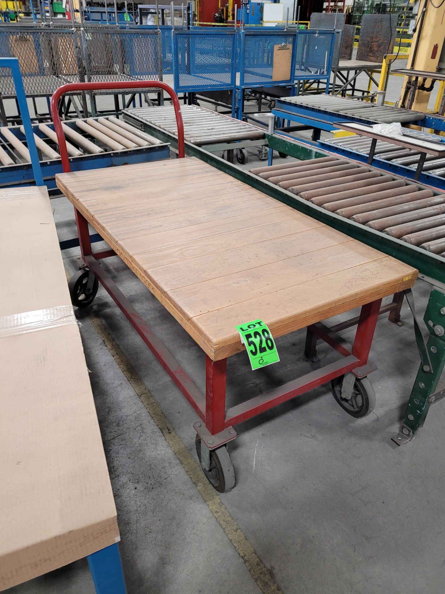 Steel platform cart w/ handle, on casters, w/ wood surface