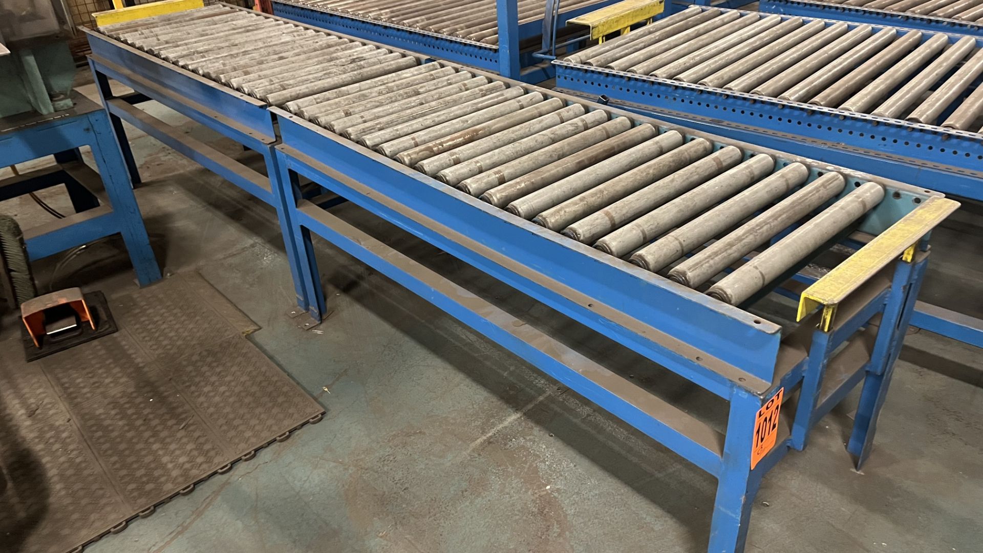 Lot of (2) 5' manual roller conveyor units w/adjustable bumper bars