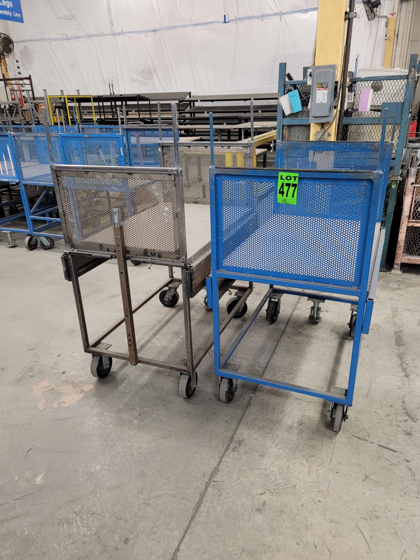 Lot of (2) steel-lattice carts w/handles, casters, floor lock and expandable sides