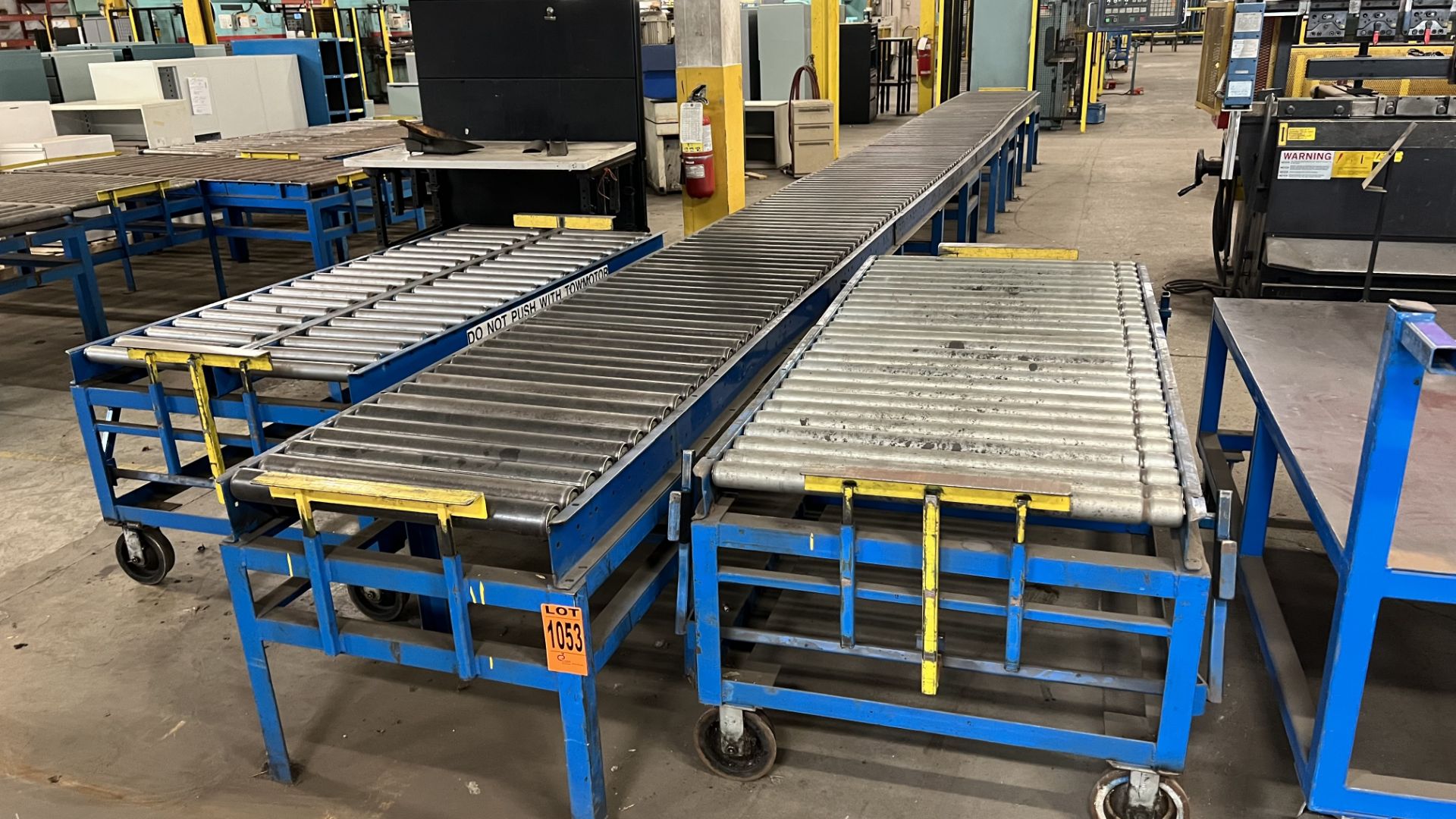 Lot of steel frame roller conveyors incl. (1) dual-track manual roller conveyor on rail wheel and ca