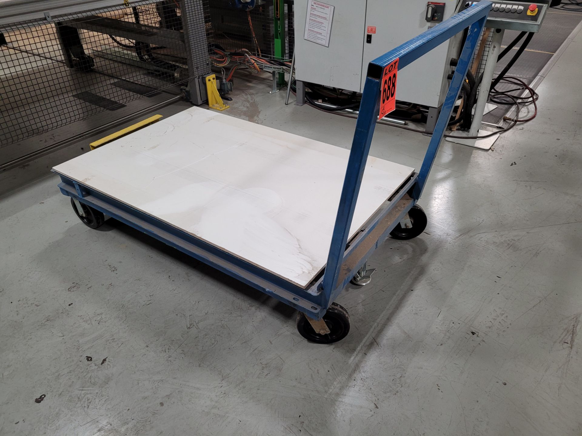 Steel frame platform cart on casters w/ handle, floor lock